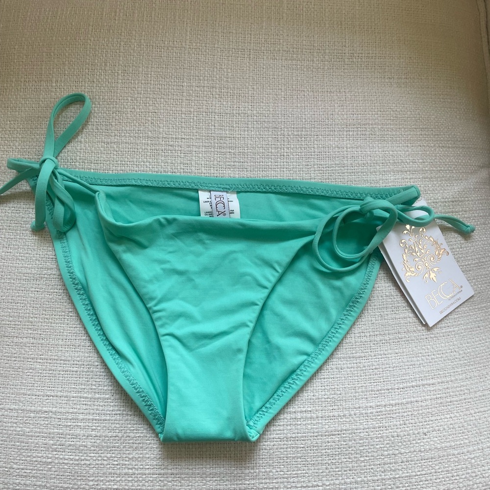 NWT. Becca Side Tie Bikini Bottom. Size small. Sexy